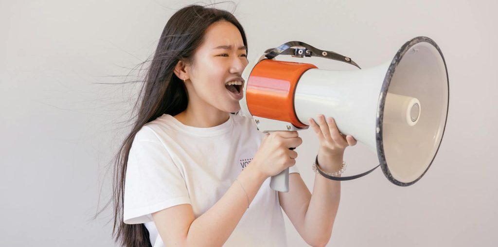 woman using megaphone